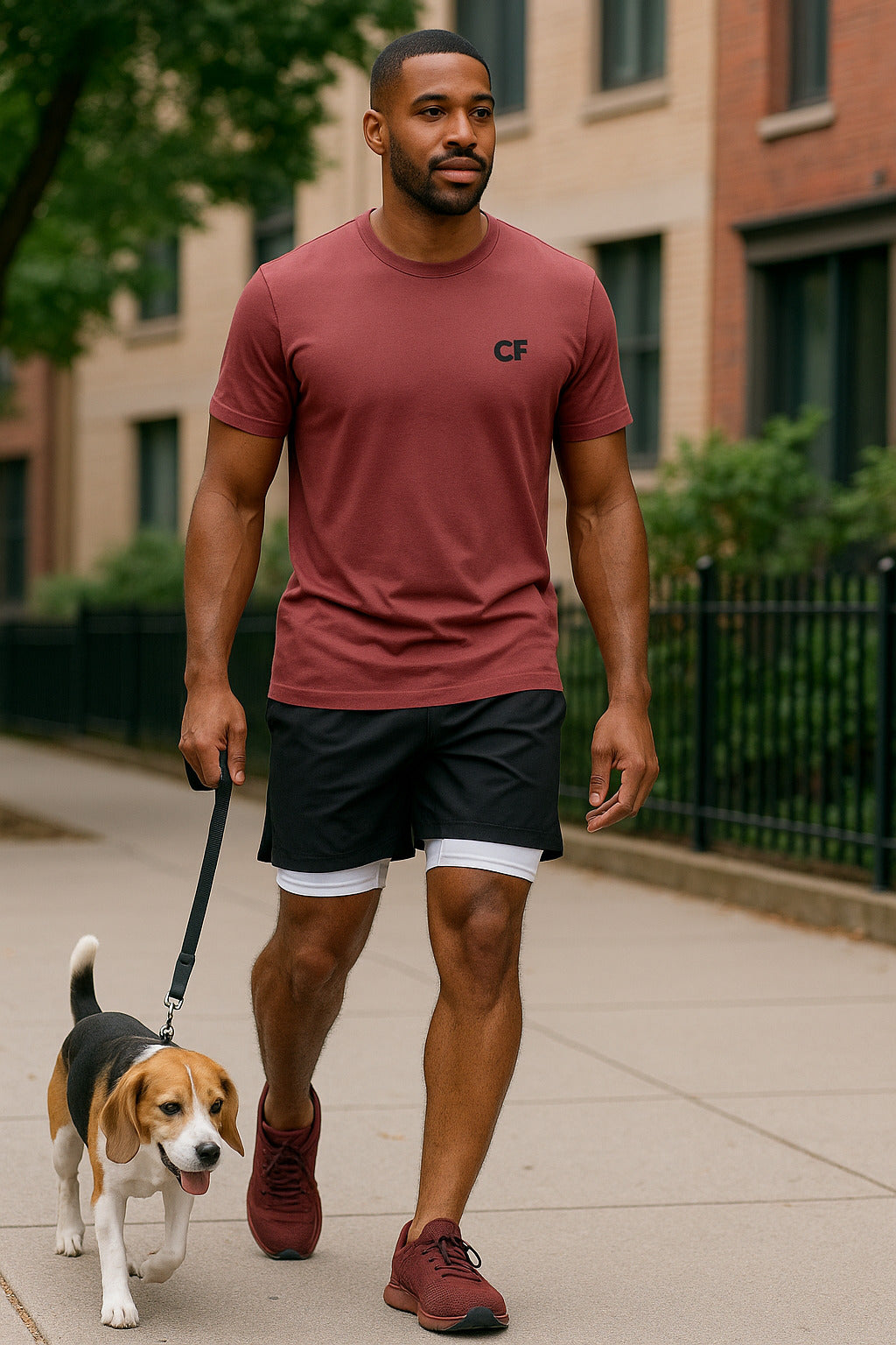 Man walking a dog on a leash wearing Black CoreFlex Shorts